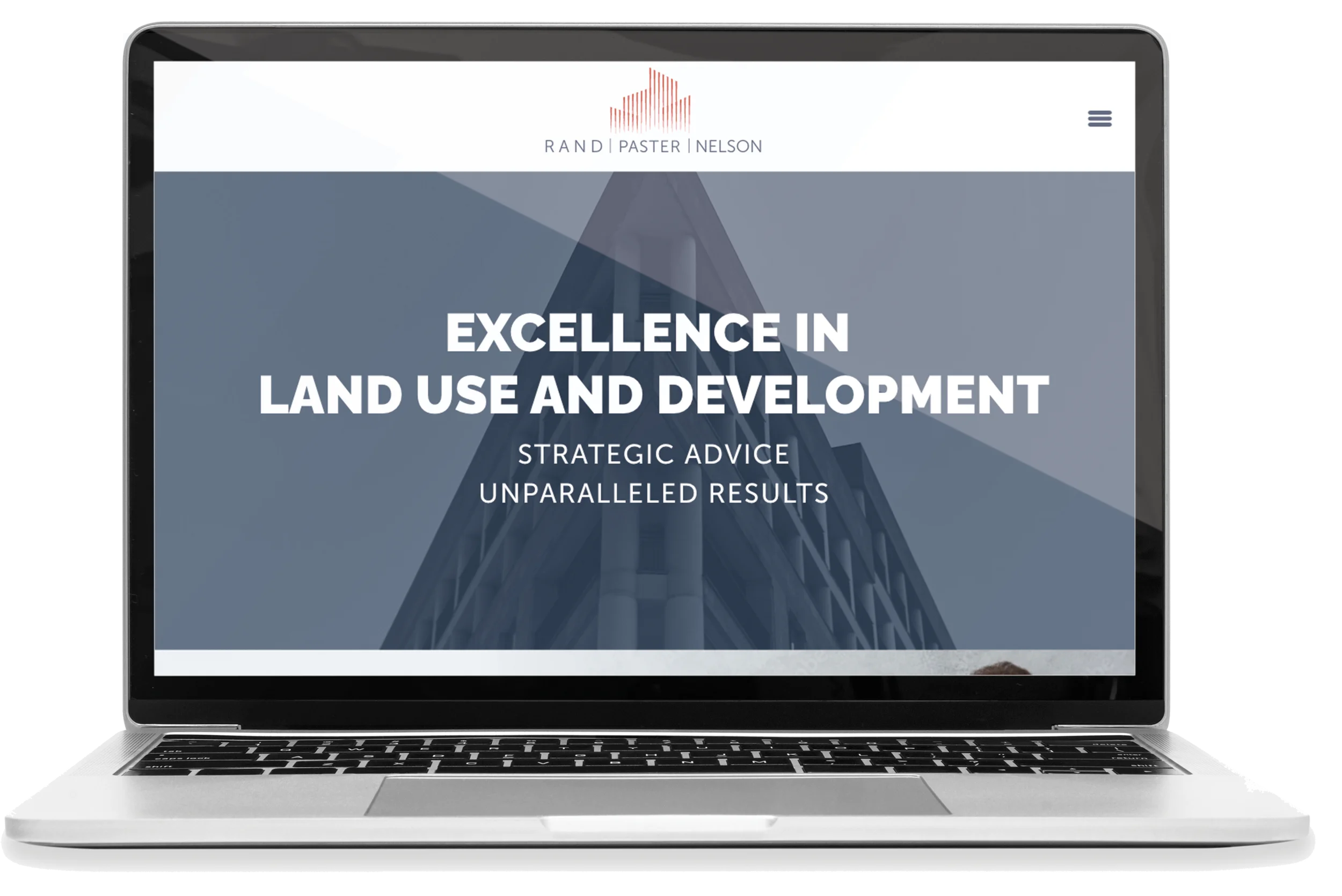 Laptop displaying a website with the text "Excellence in Land Use and Development" and the logo of Rand Paster Nelson at the top.